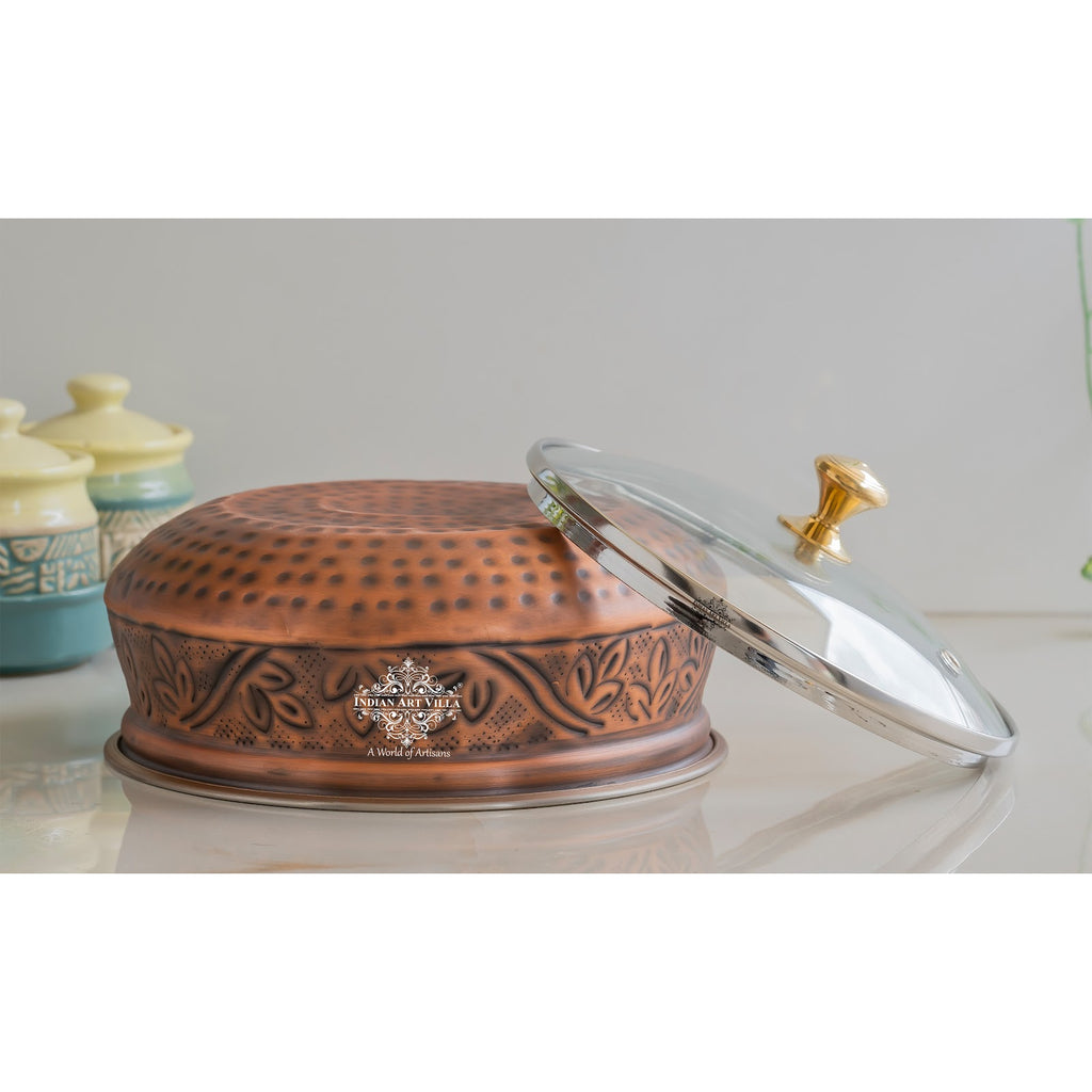 Indian Art Villa Premium Steel Copper Handi with Antique Finish, Intricate Embossed Design, and Glass Lid - Perfect for Serveware And Tableware.